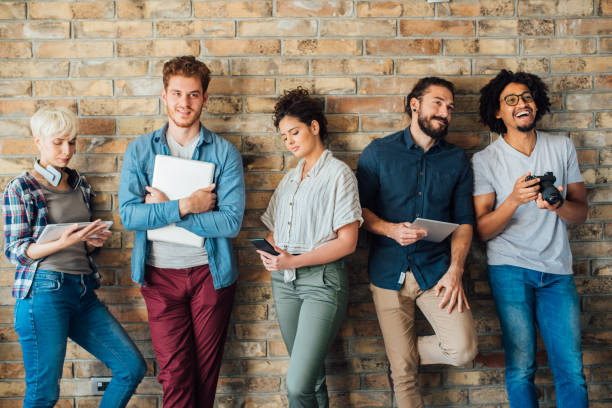istock Group of young men and women 1144861719