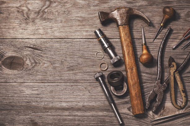 istock Various tools for jewelry works on a wooden table with copy space 1144863111