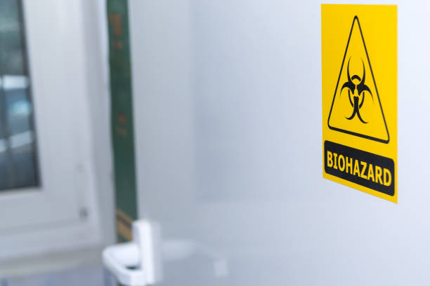 istock biohazard sign on white door 1144864524
