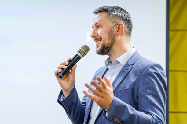 istock the speaker tells the speech at conference 1144864785