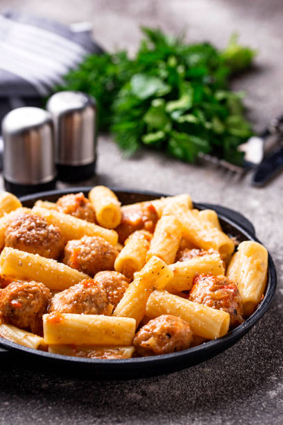 istock Pasta with meatballs in tomato sauce. 1144869664