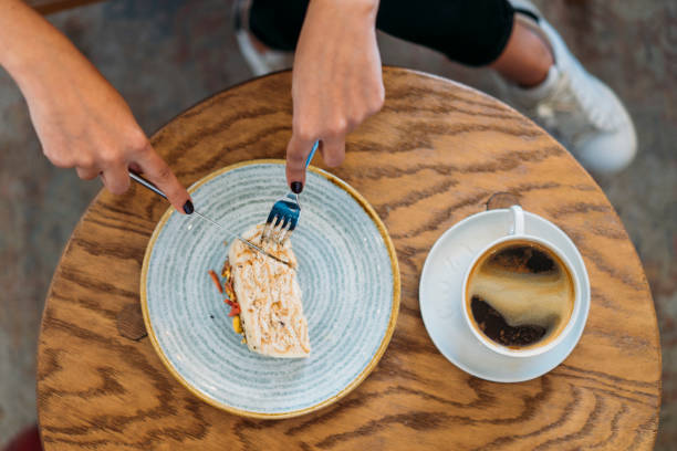 High angle view of coffee and cake on the table in a cafe