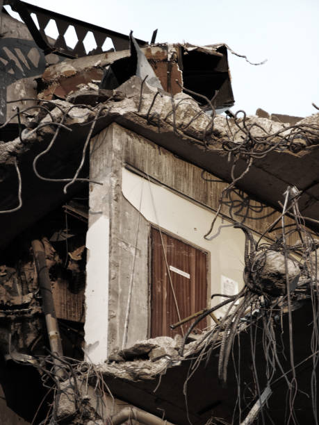 istock close up image of a wrecked collapsing building being demolished with smashed brick walls and rubble 1144871719