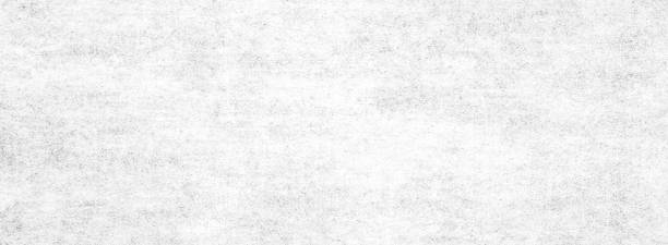 istock Long wide panoramic background in horizontal position.Monochrome light texture with shade of gray color. Grunge old wall texture, concrete cement background. 1144873013