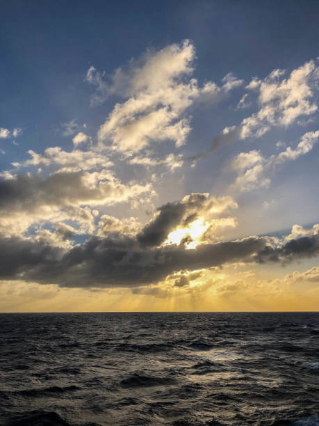 istock Sunset over Caribbean sea under moody skies 1144875230