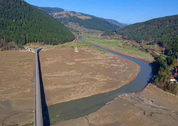 istock aerial view of bridge and river. Bistrita 1144877320