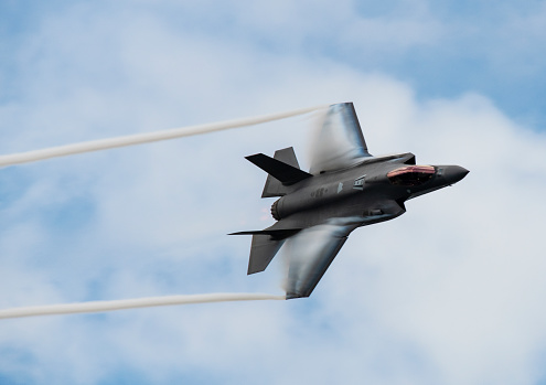 FOR EDITORIAL USE ONLY.  F35-A Lightning 2 aircraft performing a high speed, low altitude flyby.
Advanced USAF stealth fighter.
Captured on March 31, 2019.
Location is the Melbourne Air and Space Show, Melbourne, Florida.
