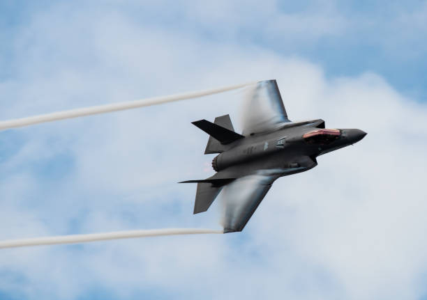 F-35A FOR EDITORIAL USE ONLY.  F35-A Lightning 2 aircraft performing a high speed, low altitude flyby.
Advanced USAF stealth fighter.
Captured on March 31, 2019.
Location is the Melbourne Air and Space Show, Melbourne, Florida. robertmichaud stock pictures, royalty-free photos & images