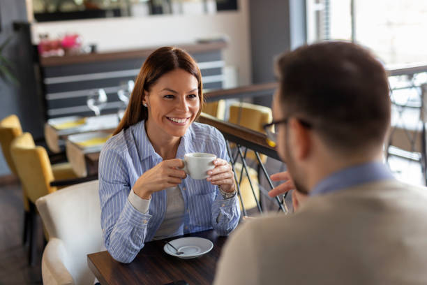 istock Couple drinking coffee in a restaurant 1144884044