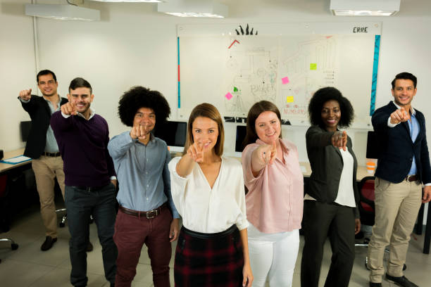 istock Group of workers standing in an office 1144886105