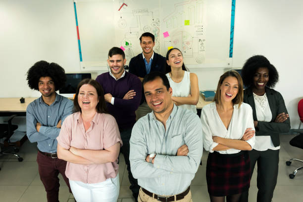 istock Group of workers standing in an office 1144886322