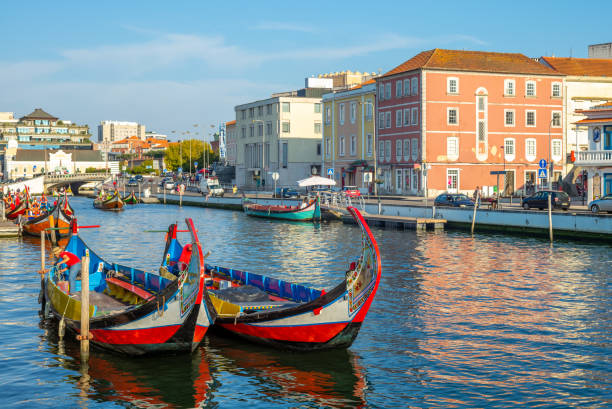 Aveiro, Venice of Portugal Boat on Canal in Aveiro, Venice of Portugal gondola traditional boat photos stock pictures, royalty-free photos & images