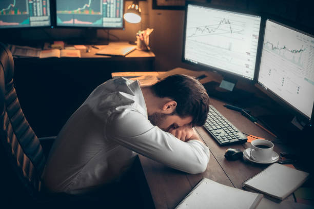 istock Young male trader at office work concept lying tired 1144910180
