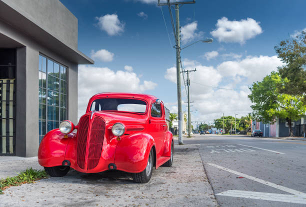 American classic car American classic red car of the 30's in the streets of Miami. car classic light tail stock pictures, royalty-free photos & images