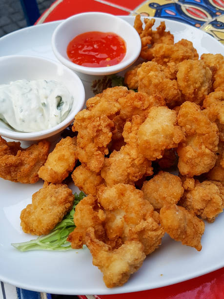 istock Deep fried boneless chicken tenders with mayonnaise and ketchup 1144927808