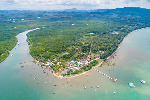 Aerial view wide shot beautiful landscape sunset tropical beach sea in south thailand Asia