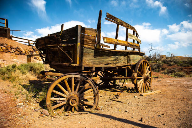 old abandoned wooden wagon in the desert