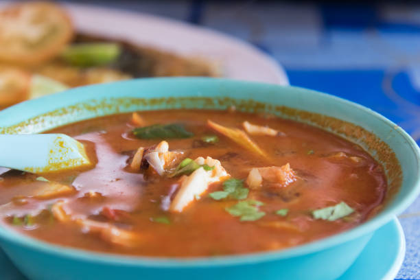 Asian hot and sour soup  (Tom Yum Kha)  soup at road side cafe