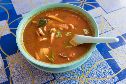 Asian hot and sour soup  (Tom Yum Kha)  soup at road side cafe
