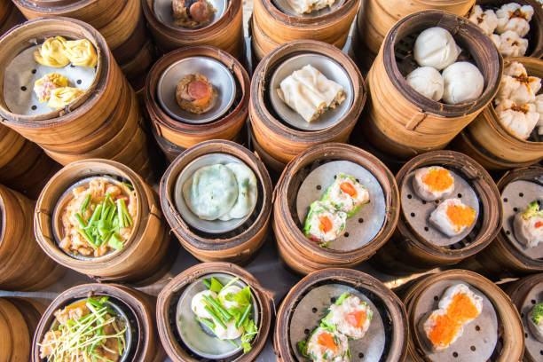 istock yumcha, dim sum in bamboo steamer, chinese cuisine 1144934966