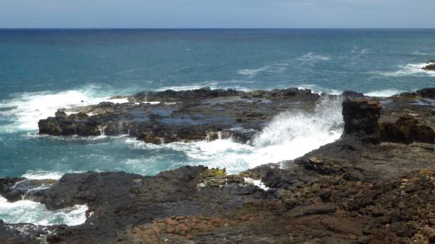 istock Blue ocean, waves, and rocky shores 1144936681