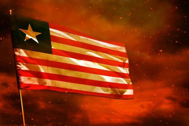 Grunge Liberia flag on old scratched wooden surface. National vintage background.