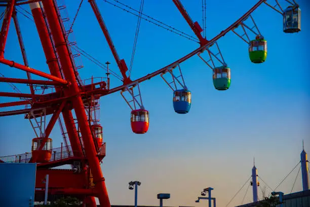 Ferris wheel behind the blue sky at the amusement park. Koutou-ku Odaiba Tokyo Japan - 01.08.2019 camera : Canon EOS 5D mark4