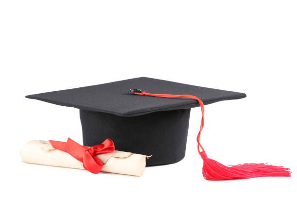 istock Graduation cap with diploma isolated on white background 1144949623