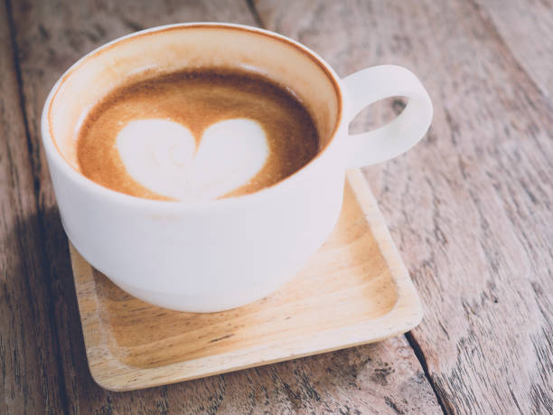 istock Hot coffee ready to drink on wood table background 1144953705
