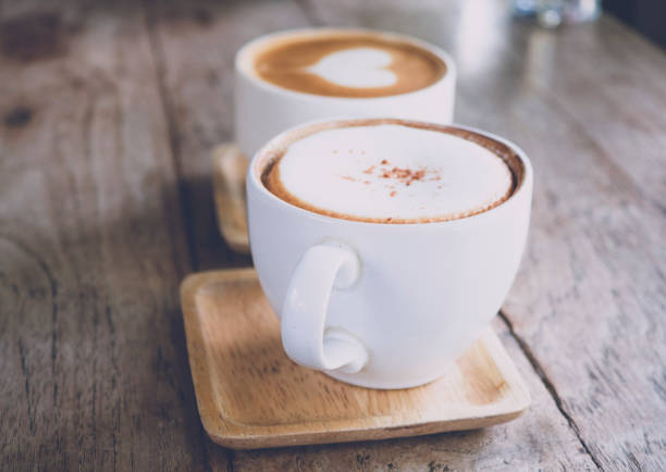 istock Hot coffee ready to drink on wood table background 1144954295