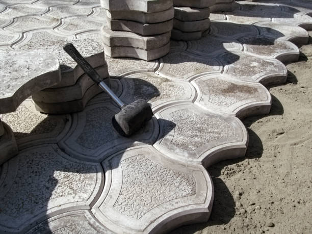 istock Unfinished work on laying paving slabs 'Bikini' 1144956552