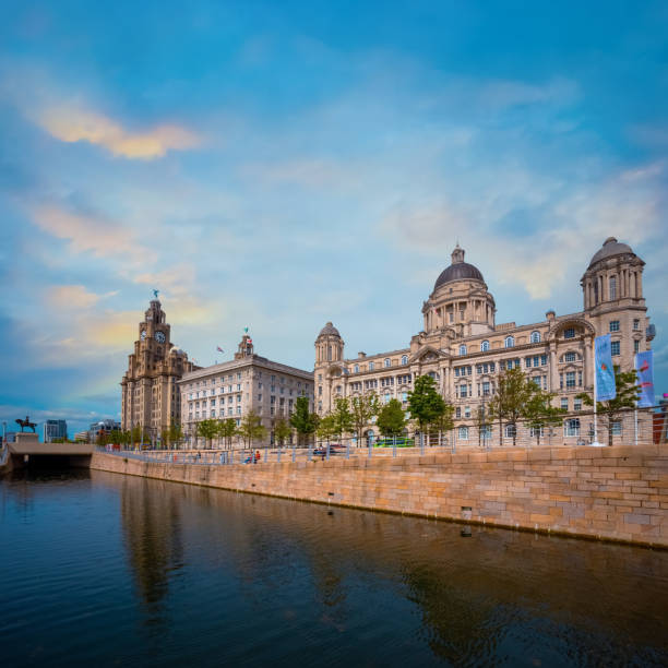 liverpool pier head with the royal liver building, cunard building and port of liverpool building - cunard building imagens e fotografias de stock