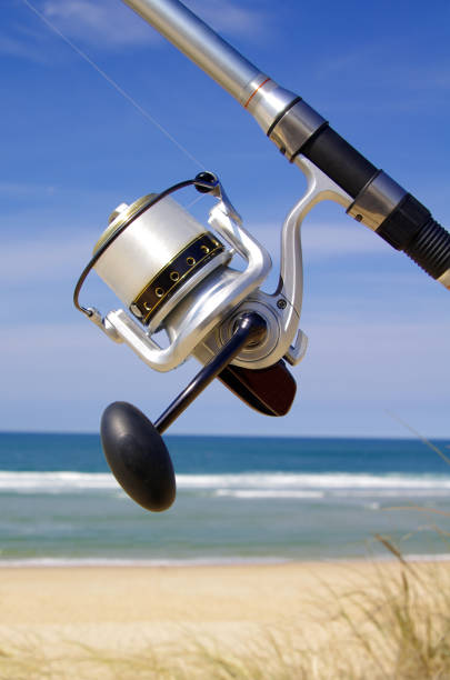 Fishing reel. Surf fishing stock photo