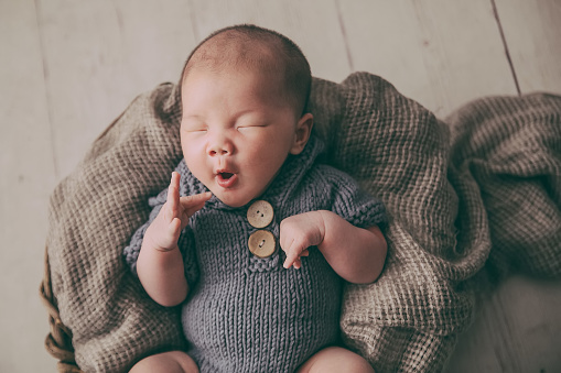 Sleeping newborn baby in China