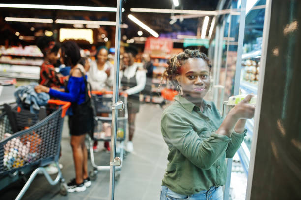 istock Group of african womans at supermarket 1144960133