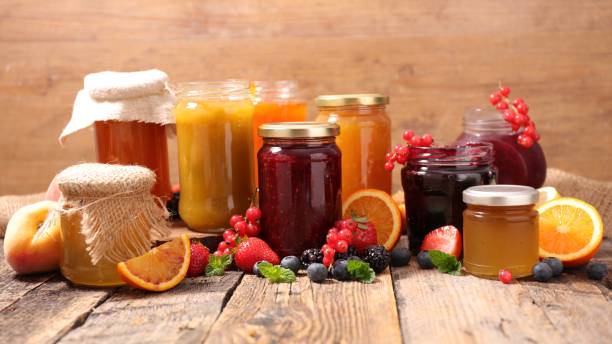 istock selection of jam on wood background 1144966677