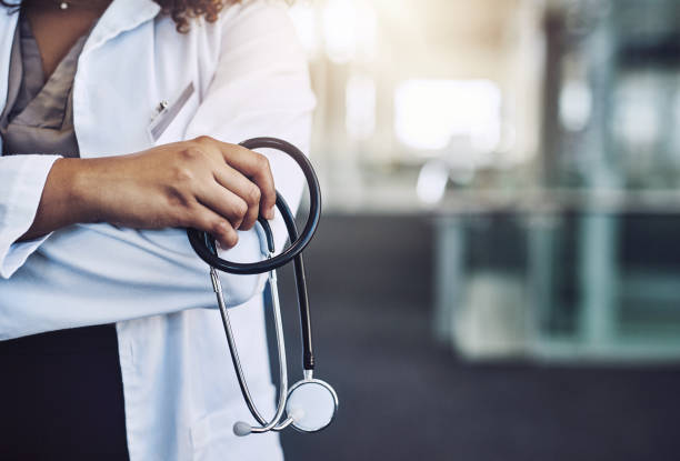 Cropped shot of an unrecognizable doctor holding s stethoscope