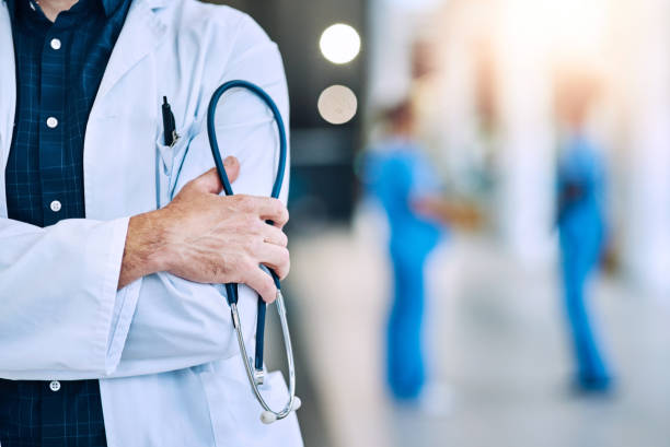 Ready for you checkup? Cropped shot of an unrecognizable doctor holding a stethoscope you are here stock pictures, royalty-free photos & images