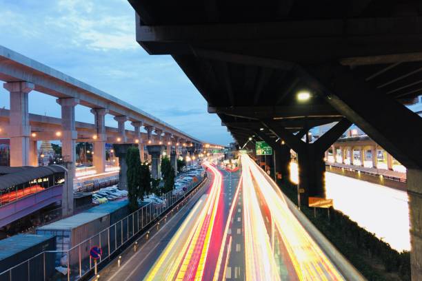 istock Light Trails On Road In City Against Sky At Night 1144972211