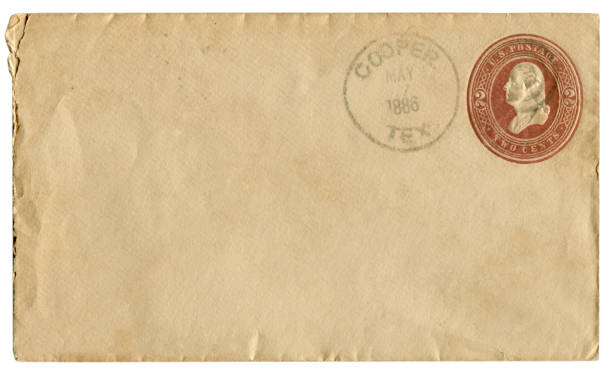 istock Cooper, Texas, The USA  - 7 May 1886: US historical envelope: cover with brown embossed imprinted stamp, two cents George Washington profile, Fancy cancel, postal cancellation 1144973300
