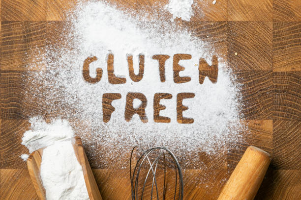 istock Gluten free baking concept - text with kitchen utencils, eggs, milk, butter 1144977526
