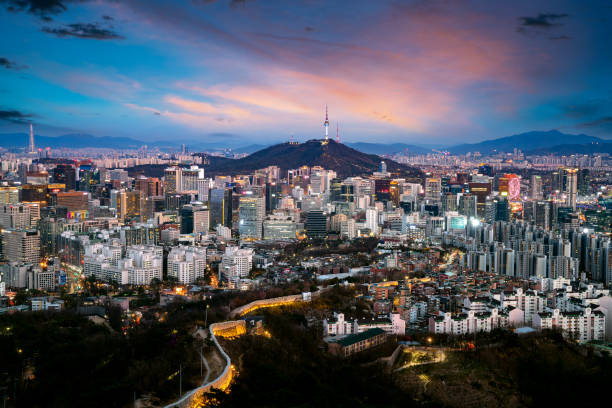 Seoul City Skyline and N Seoul Tower from Iwangsan hill stock photo