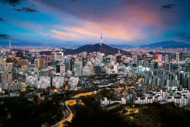 Seoul City Skyline and N Seoul Tower from Iwangsan hill in Seoul, South Korea.