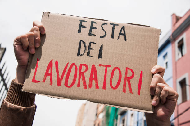 istock text may day in italian in a brown signboard 1144982442