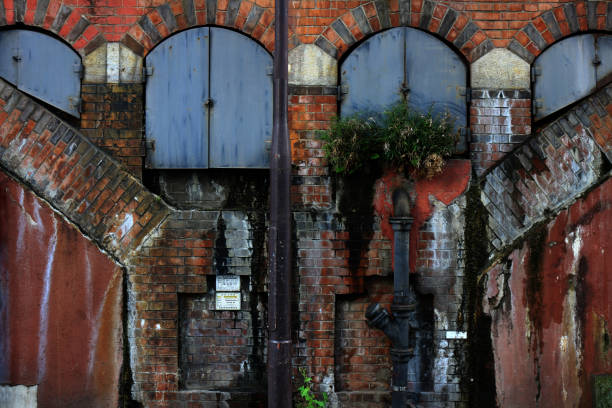 istock Old and dirty train viaduct brick wall 1144984059