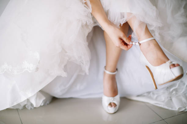 istock Bride wearing wedding heels on wedding day 1144984517