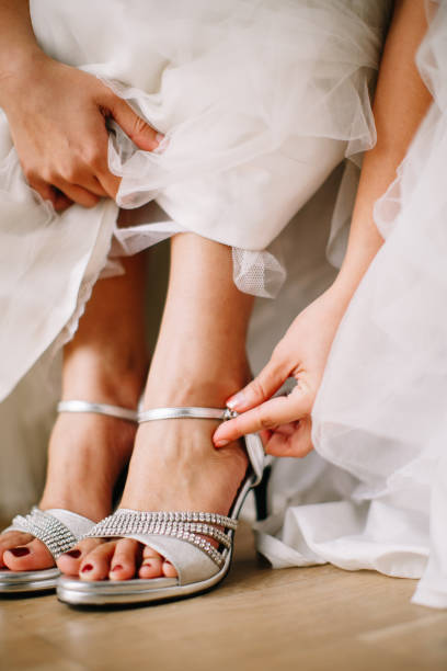 istock Bride wearing wedding heels on wedding day 1144984740