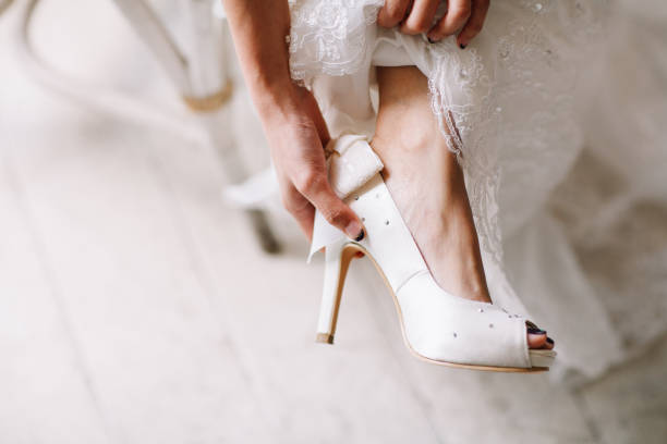 istock Bride wearing wedding heels on wedding day 1144984744