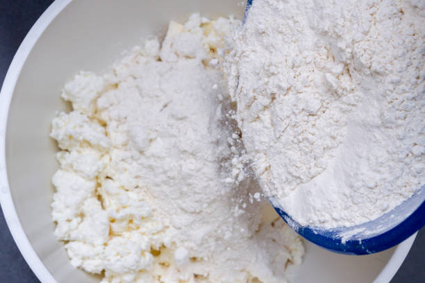 istock In a bowl with ingredients butter and cottage cheese for biscuits add flour 1144987774