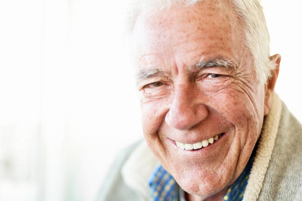 istock Friendly, relaxed  senior man smiling at camera 1144990789